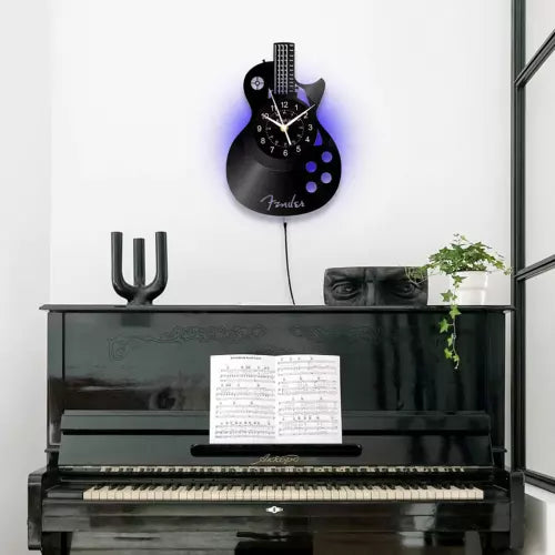 Gitaarvormige Wandklok voor Muziekliefhebbers - geeft een creatieve twist aan elke kamer -  extra grote wijzers en duidelijke cijfers - huishoudmeester